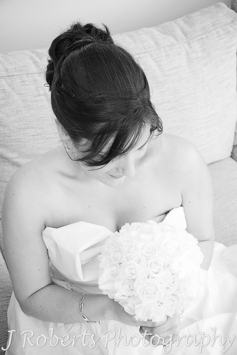 Bride looking down at her bouquet - wedding photography sydney